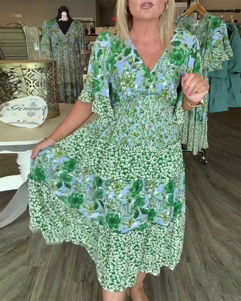 Quinta | Dress With V Neck Lotus Sleeves Floral Print