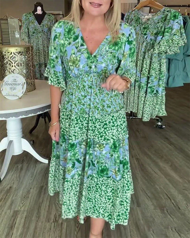 Quinta | Dress With V Neck Lotus Sleeves Floral Print