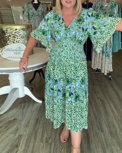 Quinta | Dress With V Neck Lotus Sleeves Floral Print